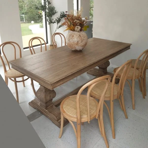 Long Pedestal Dining Table with Loop-Back Chairs