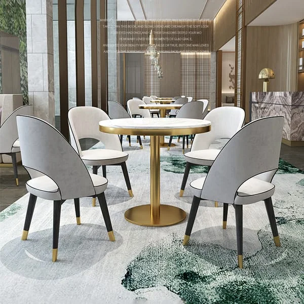 Round Pedestal Dining Table with Shell-Back Chairs