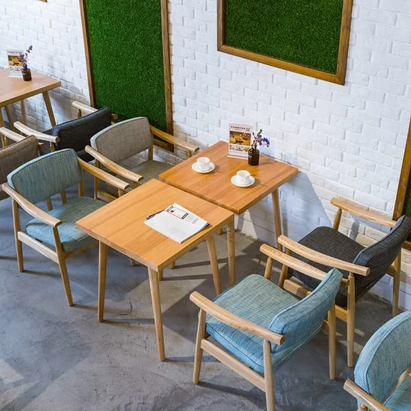 Square Café Table with Cushioned Armchairs